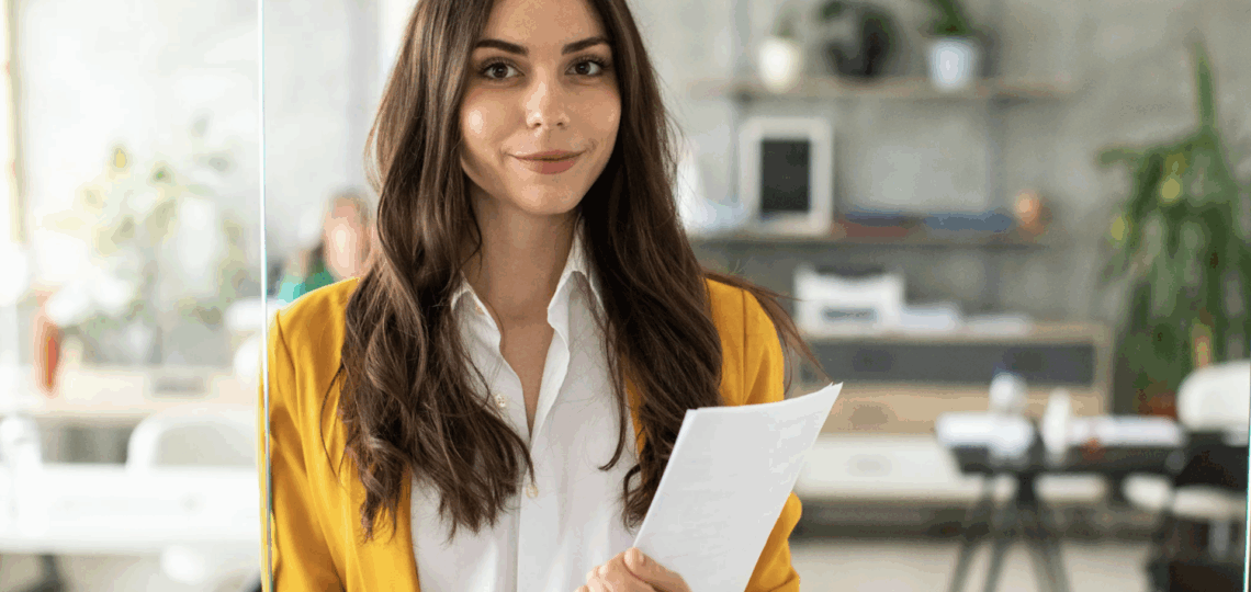 How Can I Get A Raise? A young woman holding a file wonders.